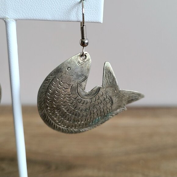 Silver etched metal fish shape earrings. - Picture 2 of 6
